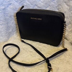 Michael Kors Elegant Black Crossbody Bag with Gold Accents